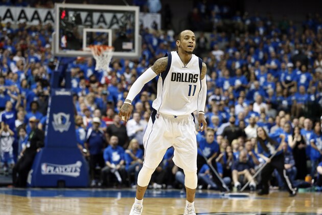 Dallas Mavericks' Monta Ellis (11) watches one of his sots in Game 4 in an NBA basketball first-round playoff series against the Houston Rockets Sunday April 26, 2015, in Dallas. (AP Photo/Tony Gutierrez)