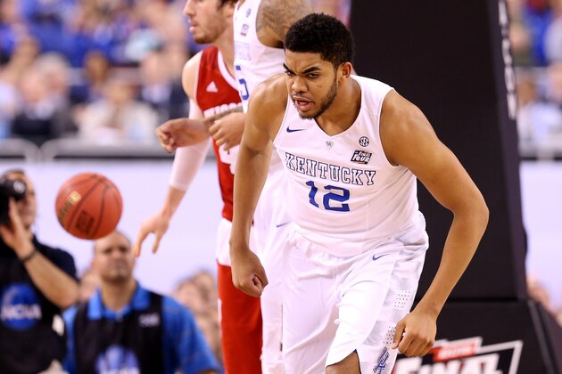 INDIANAPOLIS, IN - APRIL 04: Karl-Anthony Towns #12 of the Kentucky Wildcats reacts after a play in the second half against the Wisconsin Badgers during the NCAA Men's Final Four Semifinal at Lucas Oil Stadium on April 4, 2015 in Indianapolis, Indiana.  (Photo by Streeter Lecka/Getty Images)