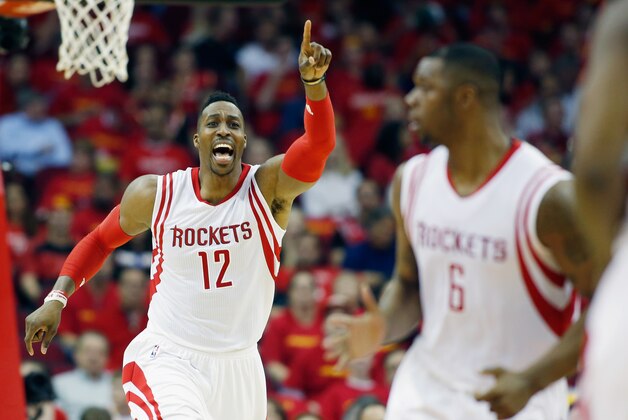 HOUSTON, TX - APRIL 28:  Dwight Howard #12 of the Houston Rockets calls a play against the Dallas Mavericks during Game Five in the Western Conference Quarterfinals of the 2015 NBA Playoffs on April 28, 2015 at the Toyota Center in Houston, Texas. NOTE TO USER: User expressly acknowledges and agrees that, by downloading and/or using this photograph, user is consenting to the terms and conditions of the Getty Images License Agreement.  (Photo by Pool/Getty Images)