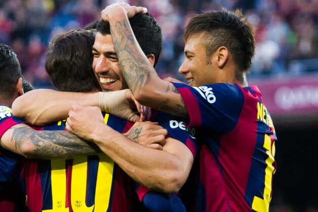 BARCELONA, SPAIN - APRIL 28: Luis Suarez (2nd R) of FC Barcelona celebrates with his teammates Dani Alves (L), Lionel Messi (2nd L) and Neymar Santos Jr (R) after scoring his team's second goal during the La Liga match between FC Barcelona and Getafe CF at Camp Nou on April 28, 2015 in Barcelona, Spain. (Photo by Alex Caparros/Getty Images)