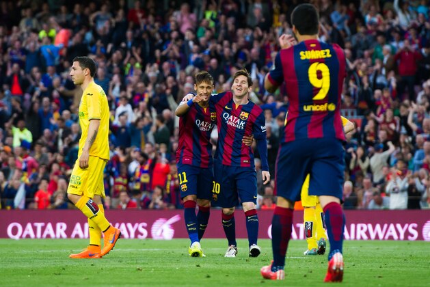 BARCELONA, SPAIN - APRIL 28: Neymar Santos Jr (CL) of FC Barcelona celebrates with his teammate Lionel Messi (CR) after scoring his team's third goal during the La Liga match between FC Barcelona and Getafe CF at Camp Nou on April 28, 2015 in Barcelona, Spain. (Photo by Alex Caparros/Getty Images)