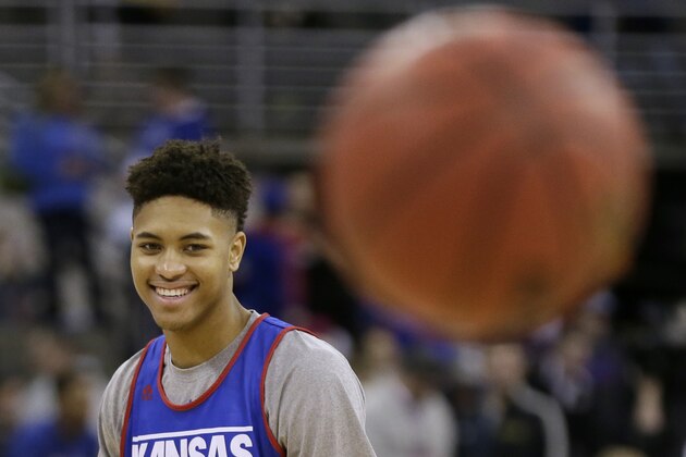 Kansas guard Kelly Oubre Jr. laughs during practice for an NCAA college basketball tournament second round game, Thursday, March 19, 2015, in Omaha, Neb. Kansas plays New Mexico State on Friday. (AP Photo/Charlie Neibergall)