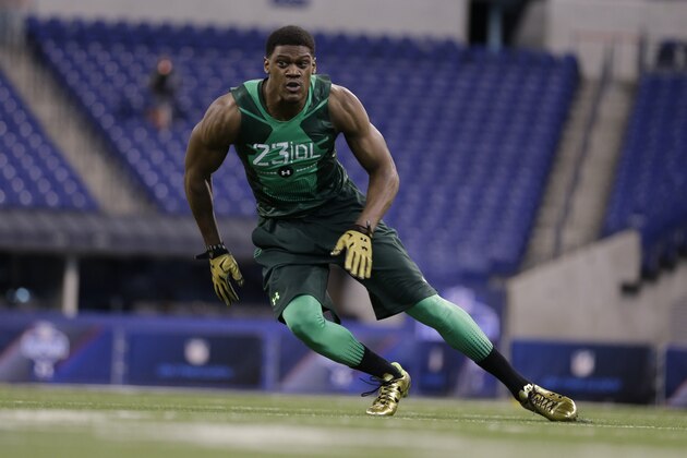 Nebraska defensive lineman Randy Gregory runs a drill at the NFL football scouting combine in Indianapolis, Sunday, Feb. 22, 2015. (AP Photo/David J. Phillip)