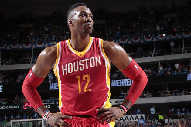 DALLAS, TX - APRIL 26: Dwight Howard #12 of the Houston Rockets against the Dallas Mavericks during Game Four of the Western Conference Quarterfinals of the 2015 NBA Playoffs on April 26, 2015 at the American Airlines Center in Dallas, Texas. NOTE TO USER: User expressly acknowledges and agrees that, by downloading and or using this photograph, User is consenting to the terms and conditions of the Getty Images License Agreement. Mandatory Copyright Notice: Copyright 2015 NBAE (Photo by Glenn James/NBAE via Getty Images)
