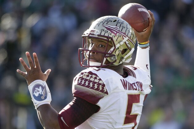 Florida State quarterback Jameis Winston prepares to throw against Oregon during the first half of the Rose Bowl NCAA college football playoff semifinal, Thursday, Jan. 1, 2015, in Pasadena, Calif. (AP Photo/Jae C. Hong)