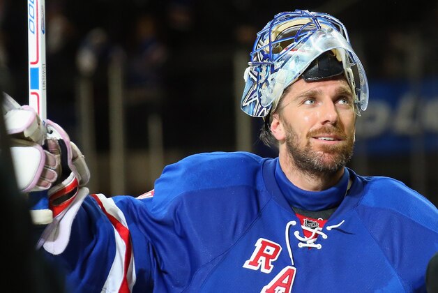 NEW YORK, NY - APRIL 24: Henrik Lundqvist #30 of the New York Rangers salutes the crowd following a 2-1 overtime victory against the Pittsburgh Penguins in Game Five of the Eastern Conference Quarterfinals during the 2015 NHL Stanley Cup Playoffs at Madison Square Garden on April 24, 2015 in New York City.  The Rangers defeated the Penguins 2-1 to win the series and move on to the next round of the playoffs.  (Photo by Bruce Bennett/Getty Images)