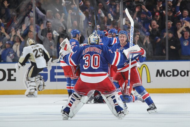 NEW YORK, NY - APRIL 24:  Henrik Lundqvist #30 and Kevin Hayes #13 of the New York Rangers celebrate after defeating the Pittsburgh Penguins 2-1 in overtime to advance out of the first round in Game Five of the Eastern Conference Quarterfinals during the 2015 NHL Stanley Cup Playoffs at Madison Square Garden on April 24, 2015 in New York City. (Photo by Jared Silber/NHLI via Getty Images)