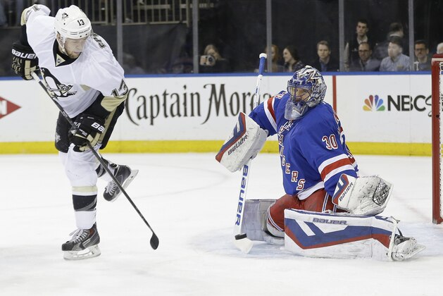 New York Rangers goalie Henrik Lundqvist (30), of Sweden, stops a shot on the goal by Pittsburgh Penguins' Nick Spaling (13) during the first period of Game 5 in the first round of the NHL hockey Stanley Cup playoffs, Friday, April 24, 2015, in New York. (AP Photo/Frank Franklin II)