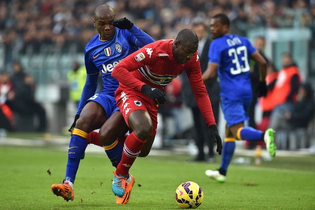 TURIN, ITALY - DECEMBER 14:  Angelo Ogbonna (L) of Juventus FC competes with Stefano Chuka Okaka of UC Sampdoria during the Serie A match between Juventus FC and UC Sampdoria at Juventus Arena on December 14, 2014 in Turin, Italy.  (Photo by Valerio Pennicino/Getty Images)