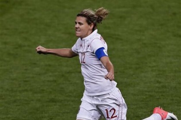 Canada's Christine Sinclair celebrates a goal during the semifinal women's soccer match between the USA and Canada in the 2012 Summer Olympics, Monday, Aug. 6, 2012, at Old Trafford in Manchester, England. (AP Photo/Ben Curtis)