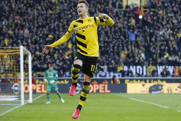 Dortmund's Marco Reus during the German first division Bundesliga soccer match between BvB Borussia Dortmund  and Schalke 04 in Dortmund, Germany, Saturday, Feb. 28, 2015. (AP Photo/Frank Augstein)