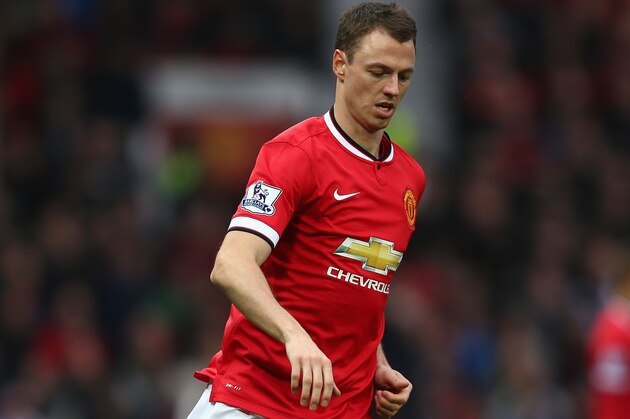 MANCHESTER, ENGLAND - FEBRUARY 28:  Jonny Evans of Manchester United in action during the Barclays Premier League match between Manchester United and Sunderland at Old Trafford on February 28, 2015 in Manchester, England.  (Photo by Clive Brunskill/Getty Images)