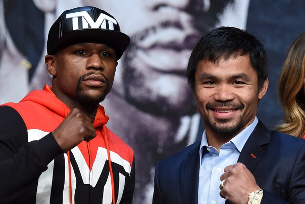 LAS VEGAS, NV - APRIL 29:  WBC/WBA welterweight champion Floyd Mayweather Jr. (L) and WBO welterweight champion Manny Pacquiao pose during a news conference at the KA Theatre at MGM Grand Hotel & Casino on April 29, 2015 in Las Vegas, Nevada. The two will face each other in a unification bout on May 2, 2015 in Las Vegas.  (Photo by Ethan Miller/Getty Images)