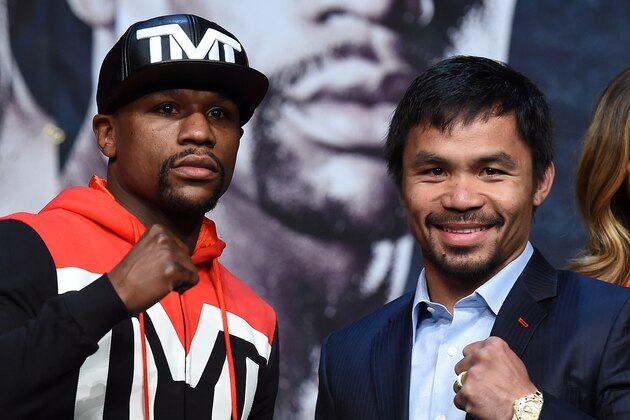 LAS VEGAS, NV - APRIL 29:  WBC/WBA welterweight champion Floyd Mayweather Jr. (L) and WBO welterweight champion Manny Pacquiao pose during a news conference at the KA Theatre at MGM Grand Hotel & Casino on April 29, 2015 in Las Vegas, Nevada. The two will face each other in a unification bout on May 2, 2015 in Las Vegas.  (Photo by Ethan Miller/Getty Images)