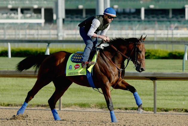 LOUISVILLE, KY - APRIL 29:  American Pharoah runs on the track during the morning training for the kentucky Derby at Churchill Downs on April 29, 2015 in Louisville, Kentucky.  (Photo by Andy Lyons/Getty Images)