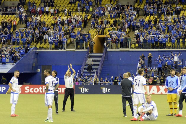 Apr 29, 2015; Montreal, Quebec, Canada; Montreal Impact head coach Franck Klopas claps his hands while his team reacts after of the second leg of the CONCACAF Champions League final against Club America at Olympic Stadium. Mandatory Credit: Eric Bolte-USA TODAY Sports