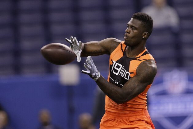 former Missouri wide receiver Dorial Green-Beckham runs a drill at the NFL football scouting combine in Indianapolis, Saturday, Feb. 21, 2015. (AP Photo/David J. Phillip)