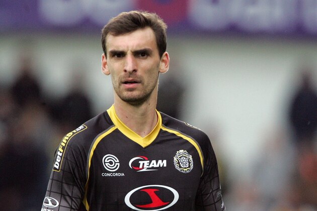 LOKERN,BELGIUM - APRIL 26:    Gregory Mertens of KSC Lokeren OV in action during the Jupiler League match between KSC Lokeren OV and Club Brugge at the Daknamstadion on April 26, 2014 in Lokeren,Belgium. (Photo by Francois Walschaerts/EuroFootball/Getty Images)
