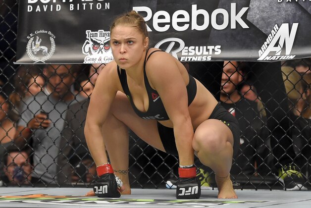 Ronda Rousey gets ready to fight Cat Zingano in a UFC 184 mixed martial arts bantamweight title bout, Saturday, Feb. 28, 2015, in Los Angeles. Rousey won after Zingano tapped out 14 seconds into the first round. (AP Photo/Mark J. Terrill)