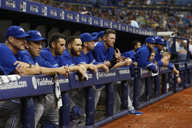 ST. PETERSBURG, FL - APRIL 26:  The Toronto Blue Jays look on from the dugout during the eighth inning of a game against the Tampa Bay Rays on April 26, 2015 at Tropicana Field in St. Petersburg, Florida.  (Photo by Brian Blanco/Getty Images)