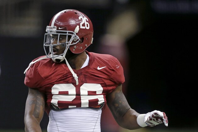 Alabama defensive back Landon Collins (26) goes through drills during NCAA college football practice at the Mercedes-Benz Superdome in New Orleans, La., Sunday, Dec. 28, 2014. Alabama is scheduled to play Ohio State in the Sugar Bowl on Jan. 1, 2015. (AP Photo/Gerald Herbert)