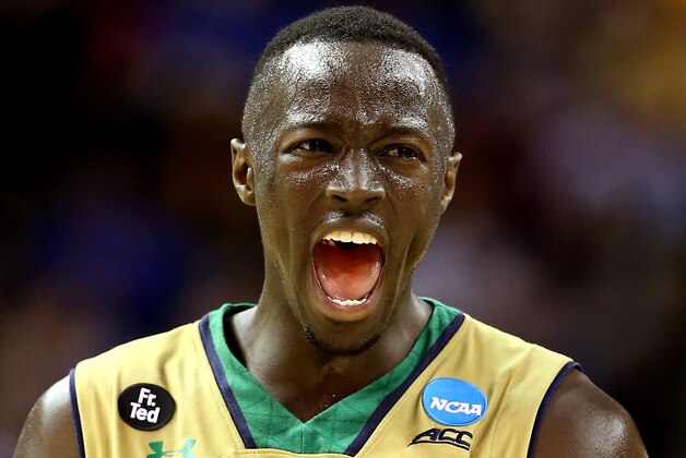 CLEVELAND, OH - MARCH 26:  Jerian Grant #22 of the Notre Dame Fighting Irish celebrates after a play in the second half against the Wichita State Shockers during the Midwest Regional semifinal of the 2015 NCAA Men's Basketball Tournament at Quicken Loans Arena on March 26, 2015 in Cleveland, Ohio.  (Photo by Andy Lyons/Getty Images)