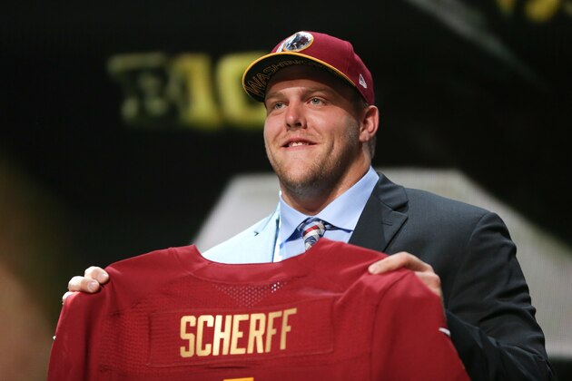 CHICAGO, IL - APRIL 30:  Brandon Scherff of the Iowa Hawkeyes holds up a jersey after being chosen #5 overall by the Washington Redskins during the first round of the 2015 NFL Draft at the Auditorium Theatre of Roosevelt University on April 30, 2015 in Chicago, Illinois.  (Photo by Jonathan Daniel/Getty Images)