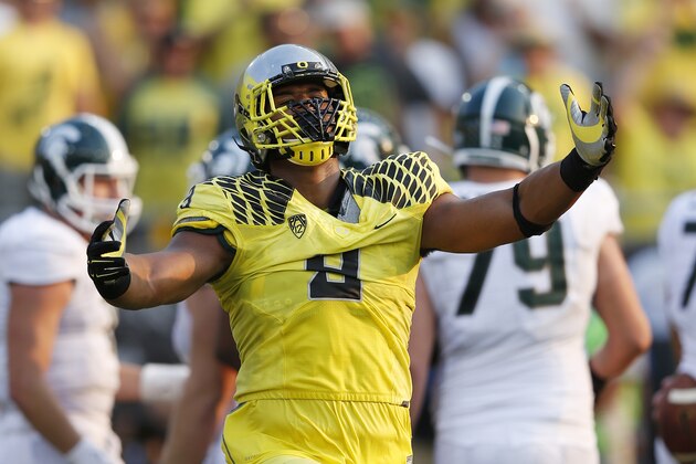 EUGENE, OR - SEPTEMBER 6: Arik Armstead #9 of the Oregon Ducks celebrates after a sack in the second half of the game against the Michigan State Spartans at Autzen Stadium on September 6, 2014 in Eugene, Oregon. Oregon won 46-27. (Photo by Joe Robbins/Getty Images)
