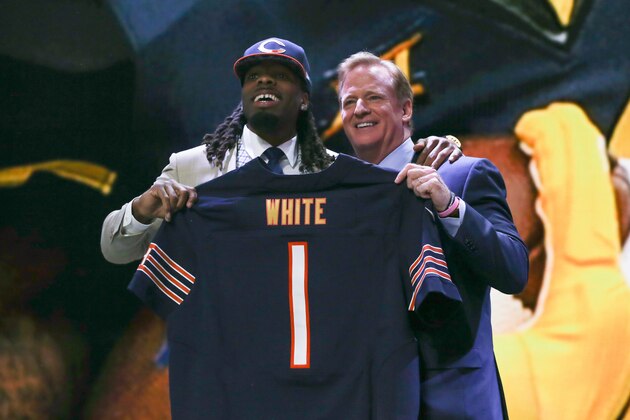 CHICAGO, IL - APRIL 30:  Kevin White of the West Virginia Mountaineers holds up a jersey with NFL Commissioner Roger Goodell after being chosen #7 overall by the Chicago Bears during the first round of the 2015 NFL Draft at the Auditorium Theatre of Roosevelt University on April 30, 2015 in Chicago, Illinois.  (Photo by Jonathan Daniel/Getty Images)