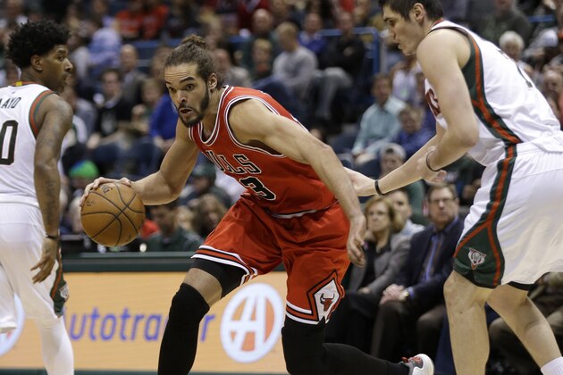 MILWAUKEE, WI - APRIL 30: Joakim Noah #13 of the Chicago Bulls drives to the hoop for two points during the third quarter against the Milwaukee Bucks in the first round of the 2015 NBA Playoffs at the BMO Harris Bradley Center on April 30, 2015 in Milwaukee, Wisconsin. NOTE TO USER: User expressly acknowledges and agrees that, by downloading and or using the photograph, User is consenting to the terms and conditions of the Getty Images License Agreement. (Photo by Mike McGinnis/Getty Images)