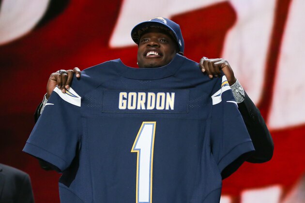 CHICAGO, IL - APRIL 30:  Melvin Gordon of the Wisconsin Badgers holds up a jersey after being picked #15 overall by the San Diego Chargers during the first round of the 2015 NFL Draft at the Auditorium Theatre of Roosevelt University on April 30, 2015 in Chicago, Illinois.  (Photo by Jonathan Daniel/Getty Images)