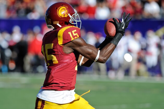 Southern California wide receiver Nelson Agholor (15) makes a touchdown reception against Fresno State in the first quarter of the Royal Purple Bowl NCAA college football game, Saturday, Dec. 21, 2013 in Las Vegas. (AP Photo/David Cleveland)