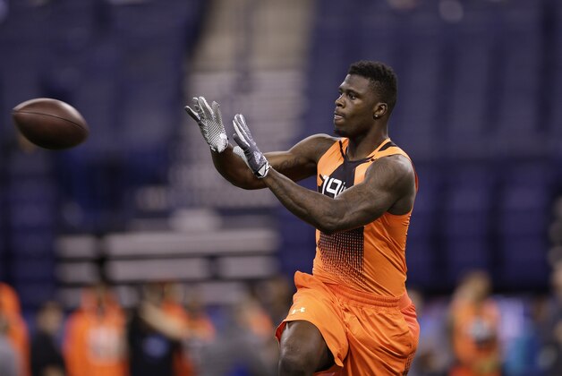 former Missouri wide receiver Dorial Green-Beckham runs a drill at the NFL football scouting combine in Indianapolis, Saturday, Feb. 21, 2015. (AP Photo/David J. Phillip)