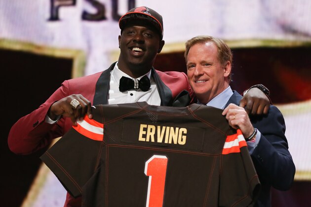 CHICAGO, IL - APRIL 30:  Cameron Erving of the Florida State Seminoles holds up a jersey with NFL Commissioner Roger Goodell after being picked #19 overall by the Cleveland Browns during the first round of the 2015 NFL Draft at the Auditorium Theatre of Roosevelt University on April 30, 2015 in Chicago, Illinois.  (Photo by Jonathan Daniel/Getty Images)