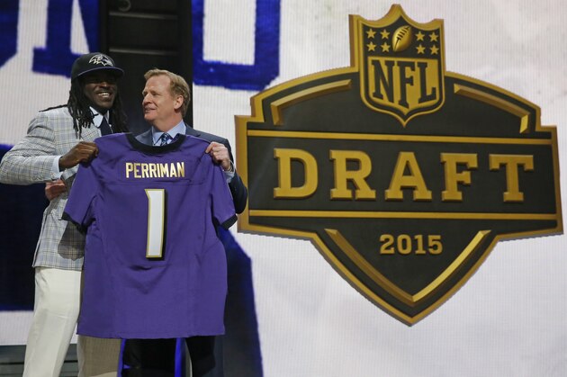 Central Florida wide receiver Breshad Perriman poses for photos with NFL commissioner Roger Goodell after being selected by the Baltimore Ravens as the 26th pick in the first round of the 2015 NFL Draft,  Thursday, April 30, 2015, in Chicago. (AP Photo/Charles Rex Arbogast)