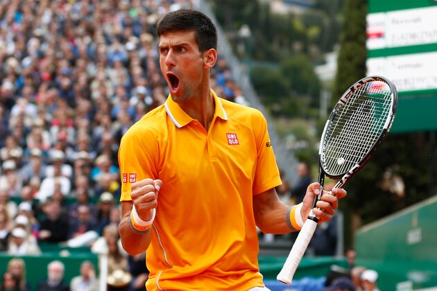 MONTE-CARLO, MONACO - APRIL 19:  Novak Djokovic of Serbia celebrates winning a game against Tomas Berdych of Czech Republic in the final during day eight of the Monte Carlo Rolex Masters tennis at the Monte-Carlo Sporting Club on April 19, 2015 in Monte-Carlo, Monaco.  (Photo by Julian Finney/Getty Images)