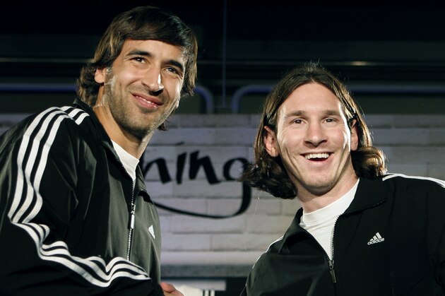 Real Madrid player Raul Gonzalez from Spain, left, and F.C. Barcelona player Leo Messi from Argentina shake hands during a promotional event in Madrid, Thursday, Dec. 13, 2007. (AP Photo/Daniel Ochoa de Olza)