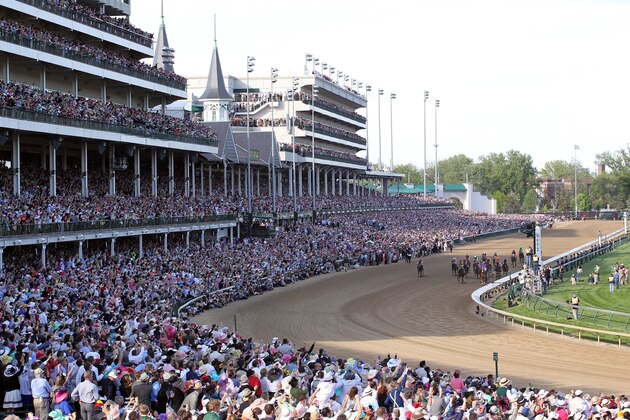 LOUISVILLE, KY - MAY 03:  California Chrome with Victor Espinoza up crosses the finish line to win the 140th running of the Kentucky Derby at Churchill Downs on May 3, 2014 in Louisville, Kentucky.  (Photo by Jamie Squire/Getty Images)