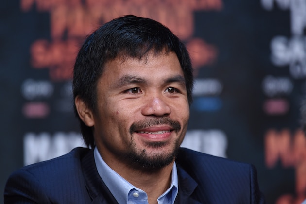 LAS VEGAS, NV - APRIL 29:  WBO welterweight champion Manny Pacquiao smiles during a news conference at the KA Theatre at MGM Grand Hotel & Casino on April 29, 2015 in Las Vegas, Nevada. Pacquiao will face WBC/WBA welterweight champion Floyd Mayweather Jr. in a unification bout on May 2, 2015 in Las Vegas.  (Photo by Ethan Miller/Getty Images)