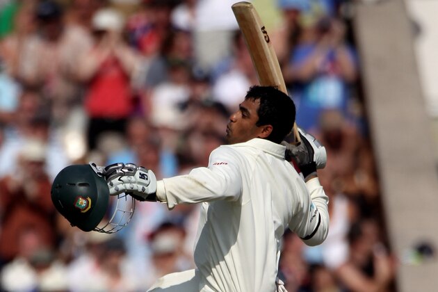 MANCHESTER, ENGLAND - JUNE 05:  Tamim Iqbal of Bangladesh celebrates his 100 on day two of the 2nd npower Test between England and Bangladesh at Old Trafford on June 5, 2010 in Manchester, England.  (Photo by Julian Herbert/Getty Images)