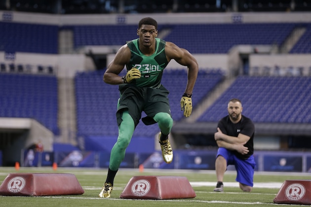 Nebraska defensive lineman Randy Gregory runs a drill at the NFL football scouting combine in Indianapolis, Sunday, Feb. 22, 2015. (AP Photo/David J. Phillip)