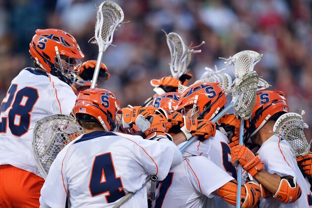 PHILADELPHIA, PA - MAY 25: The Syracuse University Orange celebrate a 9-8 win over University of Denver Pioneers during a semifinal game of the 2013 NCAA Division I Men's Lacrosse Championships  at Lincoln Financial Field on May 25, 2013 in Philadelphia, Pennsylvania. (Photo by Drew Hallowell/Getty Images)