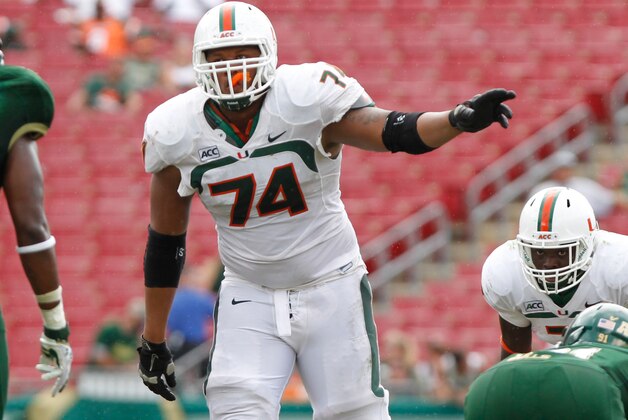 Sep 28, 2013; Tampa, FL, USA; Miami Hurricanes offensive linesman Ereck Flowers (74) against the South Florida Bulls during the second half at Raymond James Stadium. Miami Hurricanes defeated the South Florida Bulls 49-21. Mandatory Credit: Kim Klement-USA TODAY Sports