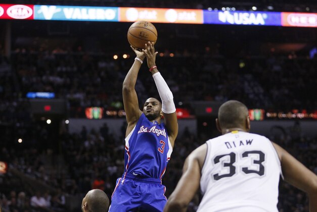 Apr 26, 2015; San Antonio, TX, USA; Los Angeles Clippers point guard Chris Paul (3) shoots the ball against the San Antonio Spurs in game four of the first round of the NBA Playoffs at AT&T Center. Mandatory Credit: Soobum Im-USA TODAY Sports
