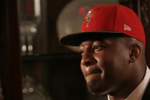 James Winston reacts to learning he is the first pick in the NFL draft Thursday, April 30, 2015 in Bessemer, Ala. Winston was drafted by the Tampa Bay Buccaneers. (AP Photo/Hal Yeager)