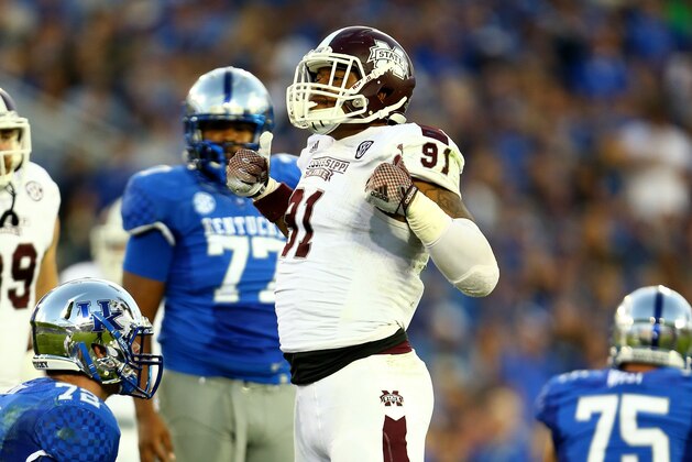 LEXINGTON, KY - OCTOBER 25:  Preston Smith #91 of the Mississippi State Bulldogs celebrates a sack during the game against the Kentucky Wildcats at Commonwealth Stadium on October 25, 2014 in Lexington, Kentucky.  (Photo by Andy Lyons/Getty Images)