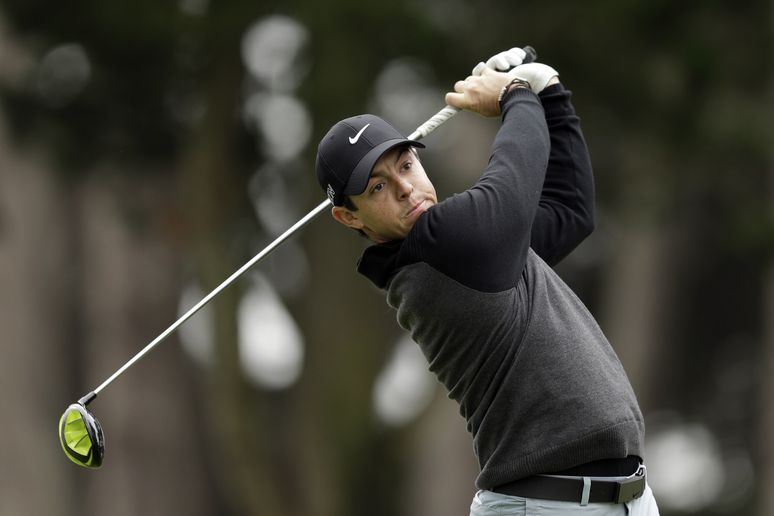 Rory McIlroy of Northern Ireland hits off the tenth tee against Billy Horschel during round three of the Match Play Championship golf tournament at TPC Harding Park Friday, May 1, 2015, in San Francisco. (AP Photo/Ben Margot)