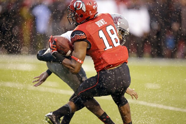 Utah defensive back Eric Rowe (18) intercepts a pass to Washington State wide receiver Isiah Myers (88) during the first quarter of an NCAA college football game Saturday, Sept. 27, 2014, in Salt Lake City. (AP Photo/Rick Bowmer)