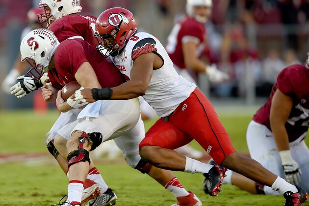 PALO ALTO, CA - NOVEMBER 15:  Nate Orchard #8 of the Utah Utes sacks quarterback Kevin Hogan #8 of the Stanford Cardinal in the second quarter at Stanford Stadium on November 15, 2014 in Palo Alto, California.  (Photo by Thearon W. Henderson/Getty Images)