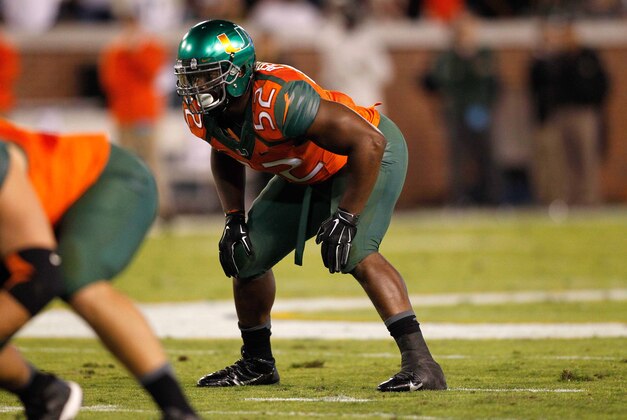 Oct 4, 2014; Atlanta, GA, USA; Miami Hurricanes linebacker Denzel Perryman (52) in action against the Georgia Tech Yellow Jackets in the first quarter at Bobby Dodd Stadium. Mandatory Credit: Brett Davis-USA TODAY Sports